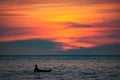 Man on the supboard on a beautiful sunset Royalty Free Stock Photo
