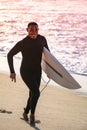 Man surfer run in the beach Royalty Free Stock Photo