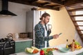 Man surfing an internet for the recipy of healthy meal Royalty Free Stock Photo