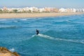 Man surfing in the Mediterranean Sea