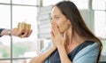 Man surprising his girlfriend with gift box on Valentine day as marriage proposal. Royalty Free Stock Photo