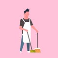 Man sweeping floor with broom and scoop guy doing housework house cleaning concept male cartoon character full length Royalty Free Stock Photo