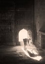 Man sweeping floor of Golconda fort inside main gate Hydrabad