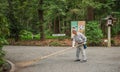 Man Sweeps path in Yoyogi Park in Tokyo. Royalty Free Stock Photo
