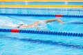 Man swimmer swimming crawl in blue water. Royalty Free Stock Photo