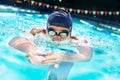 Man, swimming pool and competition for sport with splash, speed and exercise for wellness, health and fitness. Swimmer Royalty Free Stock Photo