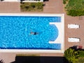 Man swimming in the pool top down view Royalty Free Stock Photo