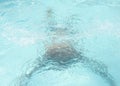 Man swimming under water in the pool. man under water in the pool Royalty Free Stock Photo