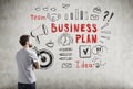 Man in T-shirt and business plan icons Royalty Free Stock Photo