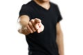 A man in a t-shirt shows a finger in the screen. Close up. Isolated background Royalty Free Stock Photo