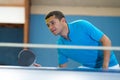 Man and table tennis match