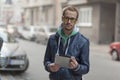 Man with Tablet Computer outdoor Royalty Free Stock Photo