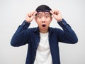 Portirait man take off his glasses for looking and feeling shocked emotion white background Royalty Free Stock Photo