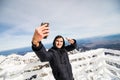 Man take selfie in Winter in High Tatras Mountains. High Tatry. Slovakia Royalty Free Stock Photo