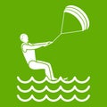 Man takes part at kitesurfing icon green