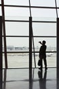 Man takes a photo on Beijing Capital International Airport