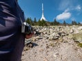 Man takes photo by film camera on Jested mountain