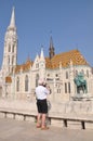 Man takes photo of Matthias Church at Budapest Royalty Free Stock Photo