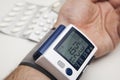 Man is examining blood pressure. High blood pressure. Royalty Free Stock Photo