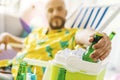 Man taking a cold beer from a cooler box