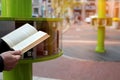 Man is taking free books on the street. little free street library