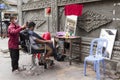 Street barber shop in Phnom Penh