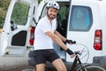 man taking bicycle out from trunk Royalty Free Stock Photo