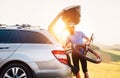 Man taking his bicycle out from the trunk of a car Royalty Free Stock Photo