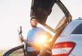 Man taking his bicycle out from the trunk of a car Royalty Free Stock Photo