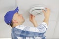 man taking out dirty air filter from ceiling Royalty Free Stock Photo