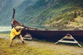 Man taking photo from old viking boat in norway Royalty Free Stock Photo