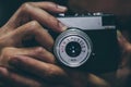 Man taking a photo with an old vintage film camera Royalty Free Stock Photo