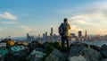 Man taking photo of San Francisco during sunset Royalty Free Stock Photo