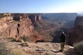 Man Taking a Photo of Shafer Trail Road in Canyonlands National Park Royalty Free Stock Photo