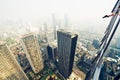 Man taking photo from skyscraper