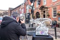 Man taking photography on a camera at ice sculpture festival