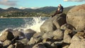 Man taking a photos with dslr camera outdoors, on the beach