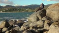 Man taking a photos with dslr camera outdoors, on the beach