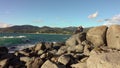 Man taking a photos with dslr camera outdoors, on the beach