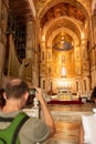 Man Taking Picture In the Cathedral of Monreale Decorated With Gold Mosaic In sicily