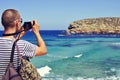 Man taking a picture in Ibiza Island, Spain Royalty Free Stock Photo