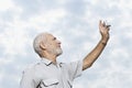 Man taking a picture of the sky Royalty Free Stock Photo