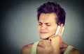 Man talking on mobile phone having headache Royalty Free Stock Photo