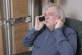 Man talking on the phone looking annoyed and angry Royalty Free Stock Photo