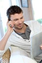 Man talking on the phone and using tablet Royalty Free Stock Photo