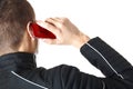 Man is talking on red smart phone | Isolated Royalty Free Stock Photo