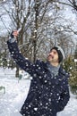 Man talking a selfie while it is snowing Royalty Free Stock Photo