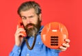 Man talking to vintage phone. businessman talking on vintage phone. buy new gadget. phone business concept. Businessman Royalty Free Stock Photo