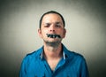 Man with the taped mouth Royalty Free Stock Photo