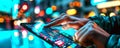 A man tapping a tablet, large touch device. Close up image of a person using fintech software.
